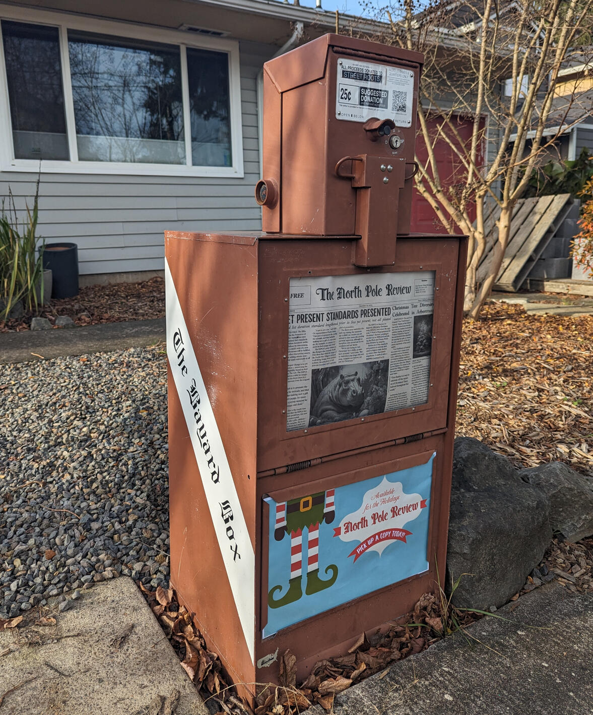 Brown newspaper vending machine, The Bayard Box